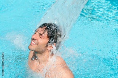 Photo: Waterfall jet at summer pool Waterfall jet at summer pool