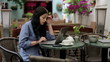 Video: Tired attractive businesswoman with laptop in cafe Tired attractive businesswoman with laptop in cafe