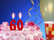 Birthday cake with red candles showing Nr. 60