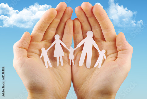 Photo: Paper family in hands Paper family in hands
