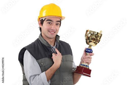 Photo: craftsman holding a trophy craftsman holding a trophy