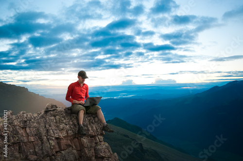 Photo: man working outdoors man working outdoors
