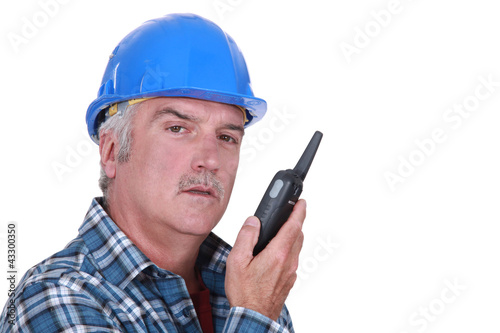 Photo: Foreman with radio receiver Foreman with radio receiver