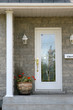 Glass door to front entrance of luxury home