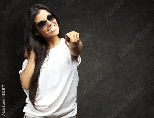 Photo: woman pointing woman pointing