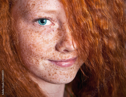 Photo: Smilig freckled girl Smilig freckled girl