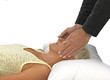Photo: Man giving healing to female patient Man giving healing to female patient