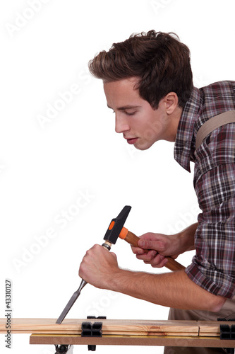 Photo: Young woodworker wood carving Young woodworker wood carving