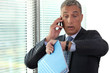 Businessman realizing he is late