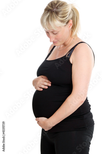 Photo: pregnant woman holding her belly pregnant woman holding her belly