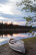 Sunset sky and canoe at Teslin River Yukon Canada