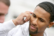 Businessman making phone call outside