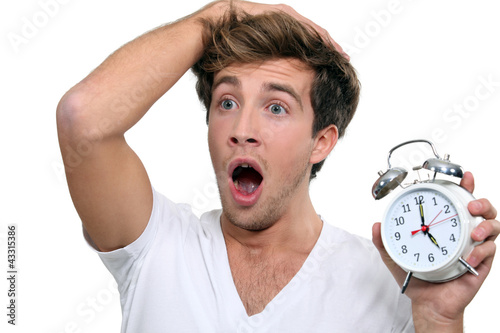 Photo: Man in a panic after sleeping in Man in a panic after sleeping in