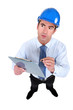shocked businessman taking notes