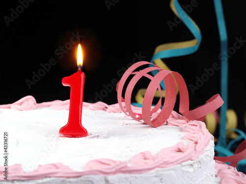 Photo: Birthday cake with red candles showing Nr. 1 Birthday cake with red candles showing Nr. 1