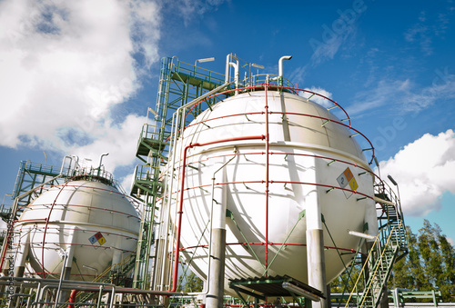 Photo: two spheres tank with blue sky two spheres tank with blue sky