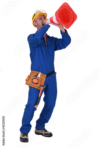 Photo: Worker signaling Worker signaling