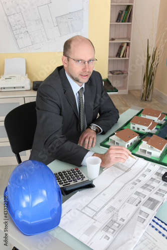 Photo: portrait of architect in office portrait of architect in office