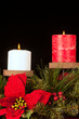 Christmas candles on black