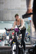 People on exercise bikes in health club