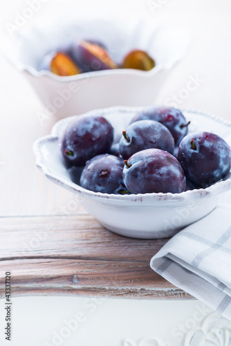 Photo: Fresh plums in a bowl Fresh plums in a bowl