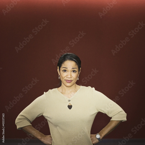Photo: Black businesswoman with hands on hips Black businesswoman with hands on hips