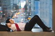 Caucasian businessman sleeping on bench