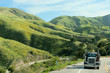 Photo: Semi-truck driving on remote highway Semi-truck driving on remote highway