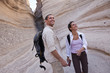Photo: Hispanic couple hiking together in canyon Hispanic couple hiking together in canyon