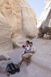 Photo: Hispanic couple hiking together in canyon Hispanic couple hiking together in canyon