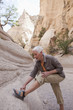 Senior Caucasian woman hiking in canyon