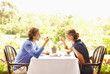 Glamorous Caucasian couple eating in restaurant