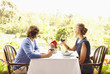 Glamorous Caucasian couple eating in restaurant