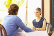 Glamorous Caucasian couple eating in restaurant
