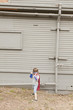 Caucasian boy dressed as superhero