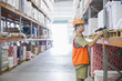 Worker scanning inventory in warehouse