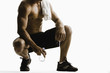 Caucasian man drinking water after exercise