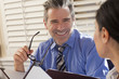 Business people holding menus in restaurant