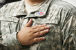 Hispanic soldier saying pledge of allegiance