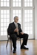 Caucasian businessman sitting in chair