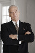 Caucasian businessman with arms crossed
