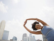 Black woman stretching before exercise