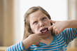 Caucasian girl making a face
