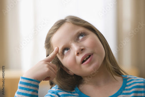 Photo: Caucasian girl thinking Caucasian girl thinking