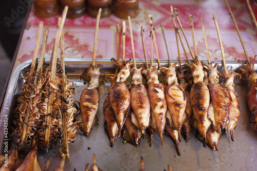 Photo: Grilled fish and squid in market Grilled fish and squid in market