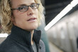 Serious Caucasian man in subway