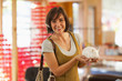 Hispanic woman shopping in store