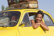 Excited couple on road trip
