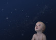 Caucasian baby looking at stars in the sky