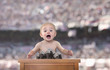 Caucasian baby speaking at podium